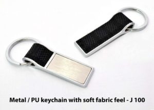 J100 – Metal / PU keychain with soft fabric feel